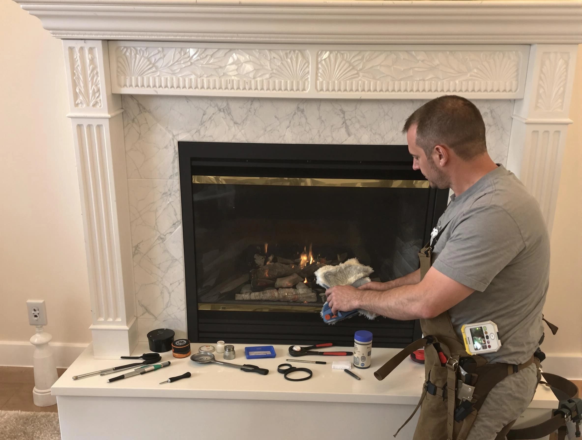 Lafayette Chimney Sweep performing fireplace maintenance in Lafayette, CO